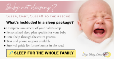 Newborn sleeping in boppy